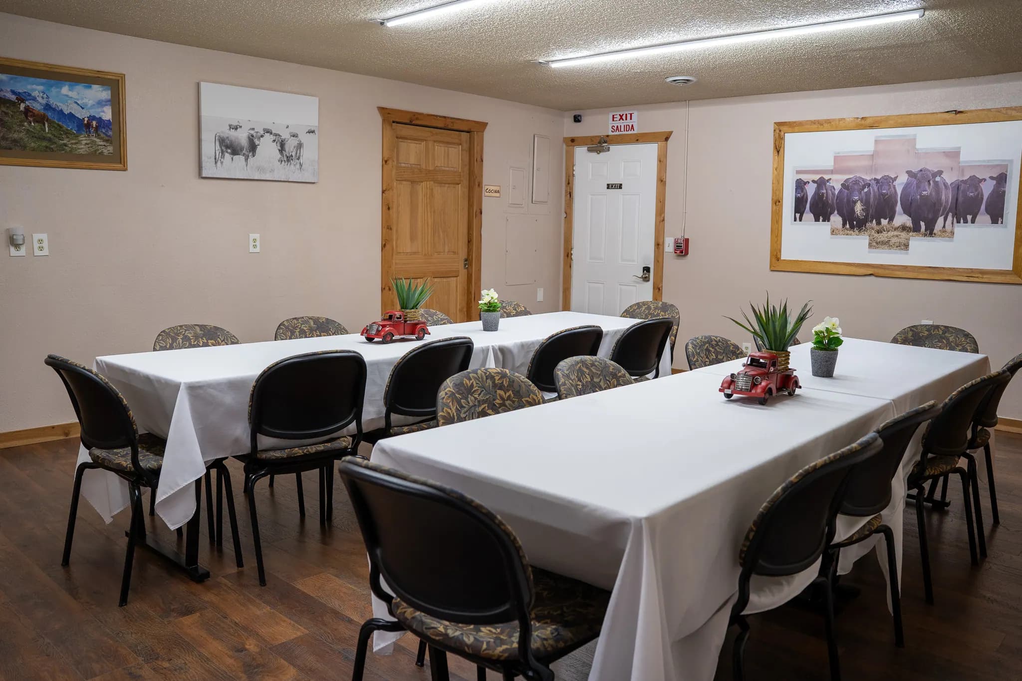 Boardroom set with long tables for a training session