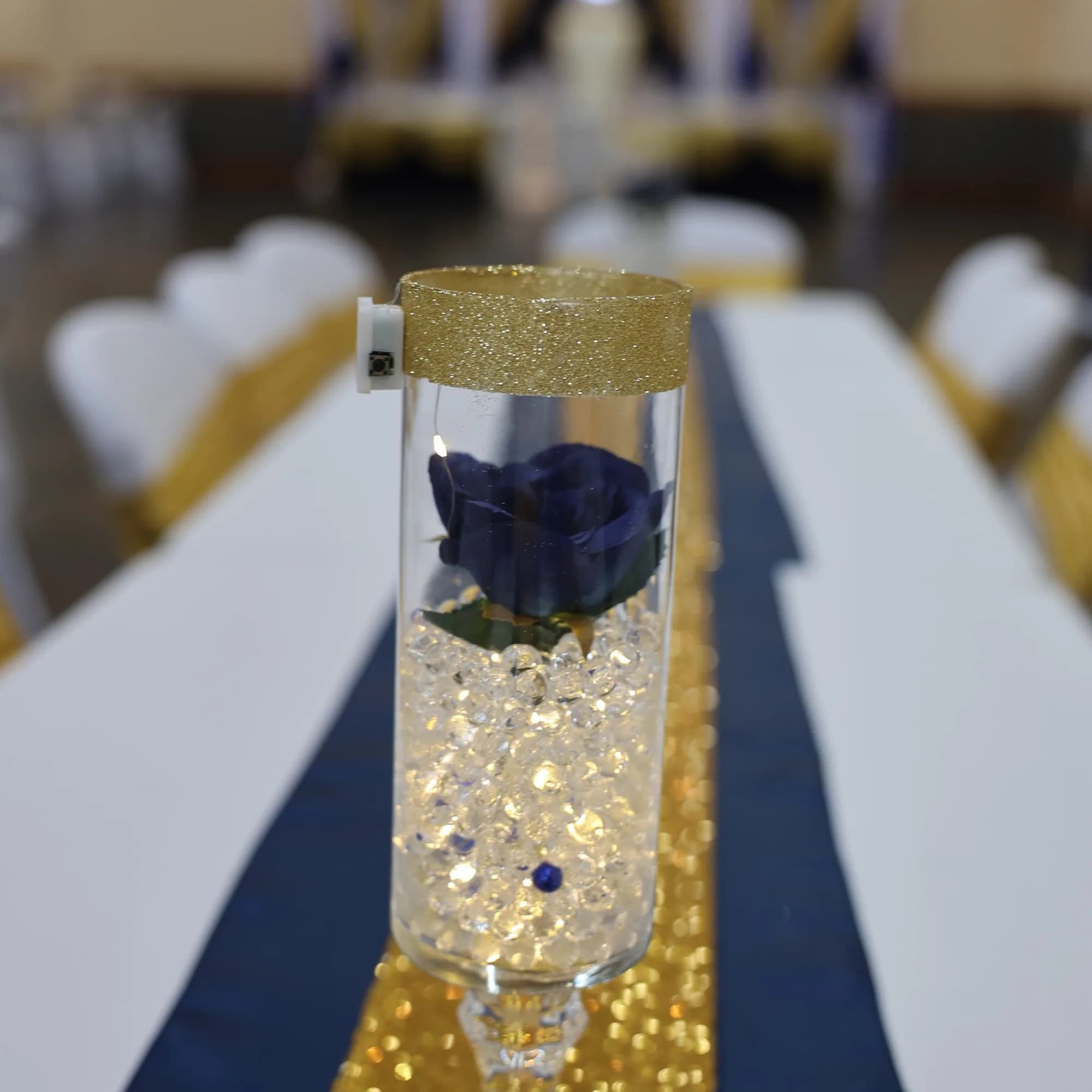 Illuminated centerpiece at a quinceañera celebration