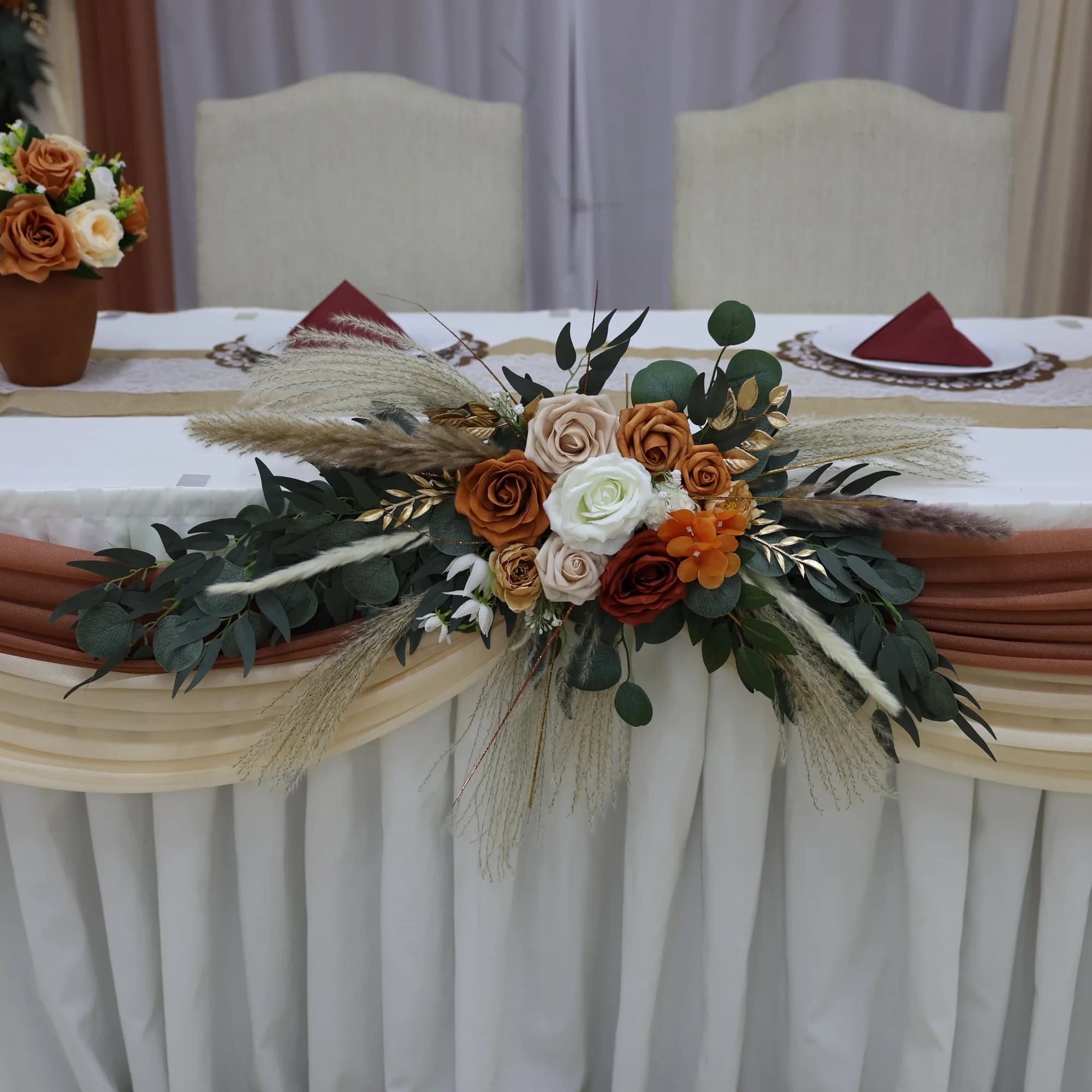 Floral swag detail on the sweetheart table skirt