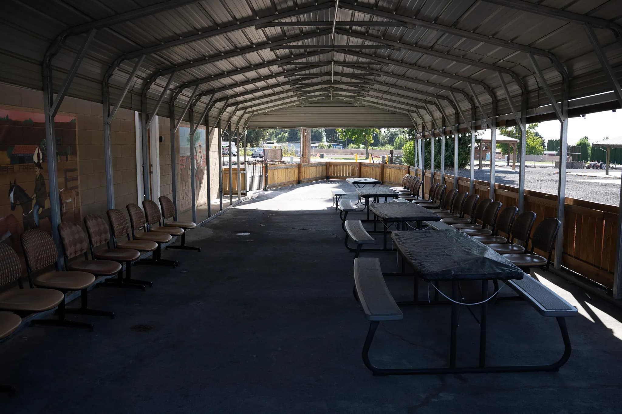 Covered outdoor patio seating adjoining the Mid-Size Hall
